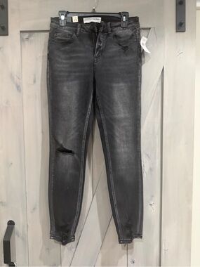Black Skinny High-Rise Jeans with Distressed Knee